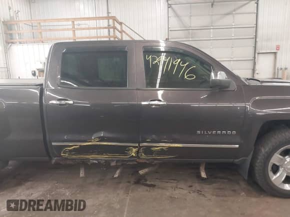 2014 Chevrolet Silverado 1500 LTZ z VIN 3GCUKSEJ5EG296189, wystawiony jako IAAI lot #42941946 z przebiegiem 196 524 mil mil oraz . Historia ofert i sprzedaży dostępna na DreamBid. Obrazek 14.