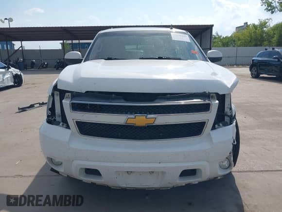 2012 Chevrolet Suburban LT z VIN 1GNSCJE03CR272306, wystawiony jako IAAI lot #43038425 z przebiegiem 193 430 mil mil oraz . Historia ofert i sprzedaży dostępna na DreamBid. Obrazek 13.