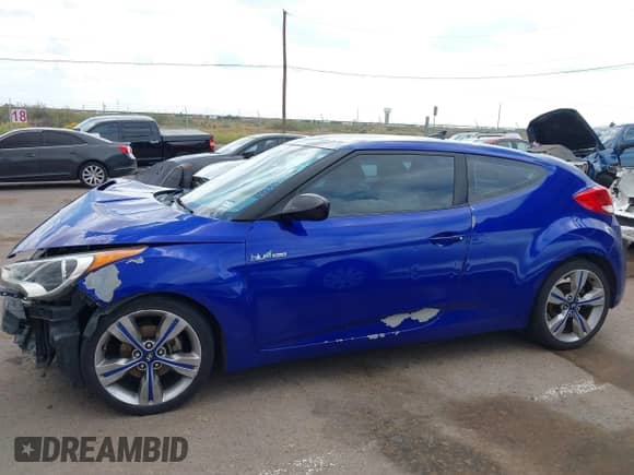 2012 Hyundai Veloster w/Black Int с VIN KMHTC6AD8CU067589, выставлен на аукционе IAAI как лот 43408833 с пробегом 159 802 миль миль и . История ставок и продаж доступна на DreamBid. Изображение 14.
