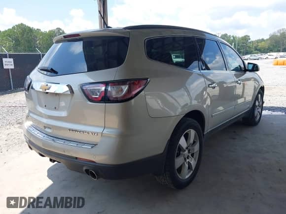 2014 Chevrolet Traverse LTZ with VIN 1GNKVJKD8EJ158689, listed as a IAAI auction lot 43038655 with 215,382 mi miles and . Bid and sale history available at DreamBid. Image 4.