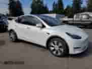 2020 Tesla Model Y Long Range с VIN 5YJYGDEE6LF023427, выставлен на аукционе Copart как лот 81877945 с пробегом 52 307 миль миль и Списание • Salvage title. История ставок и продаж доступна на DreamBid. Изображение 4.