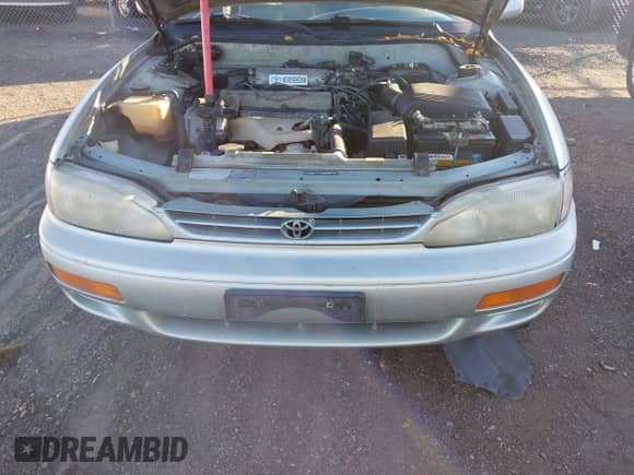 1995 Toyota Camry LE z VIN 4T1SK12E7SU554788, wystawiony jako IAAI lot #43498330 z przebiegiem 255 825 mil mil oraz . Historia ofert i sprzedaży dostępna na DreamBid. Obrazek 12.