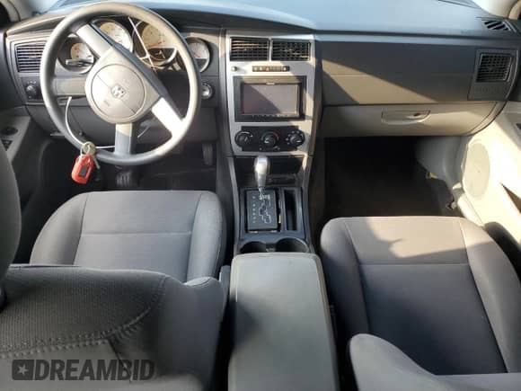 2005 Dodge Magnum SE with VIN 2D4FV48TX5H679783, listed as a Copart auction lot 80279795 with 201,901 mi miles and Clean title. Bid and sale history available at DreamBid. Image 8.