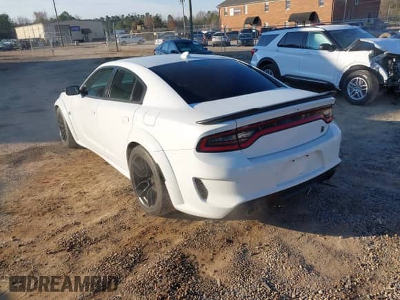 2020 Dodge Charger Scat Pack with VIN 2C3CDXGJ1LH217683, listed as a IAAI auction lot 41656722 with 70,758 mi miles and . Bid and sale history available at DreamBid. Image 3.