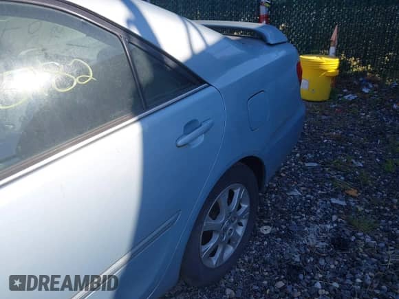 2005 Toyota Camry LE with VIN 4T1BF30K45U599118, listed as a IAAI auction lot 43154828 with Not provided miles and . Bid and sale history available at DreamBid. Image 6.