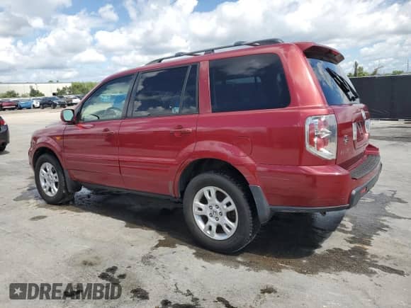 2006 Honda Pilot EX-L with VIN 5FNYF286X6B033765, listed as a Copart auction lot 56426785 with 214,921 mi miles and Salvage title. Bid and sale history available at DreamBid. Image 2.