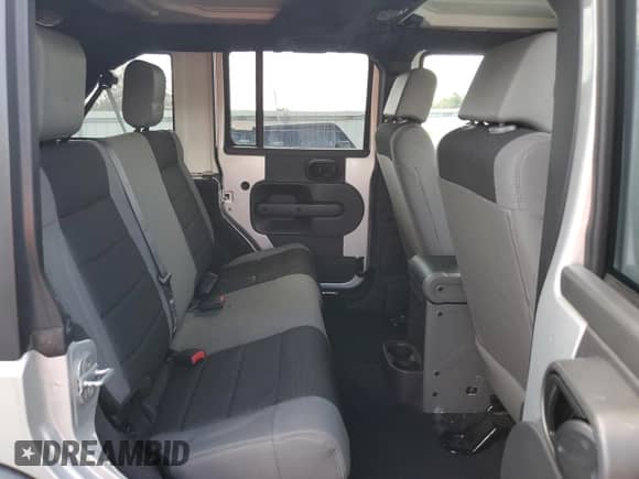 2007 Jeep Wrangler Unlimited X с VIN 1J8GA39157L198004, выставлен на аукционе Copart как лот 81825475 с пробегом 128 673 миль миль и Списание • Salvage title. История ставок и продаж доступна на DreamBid. Изображение 11.