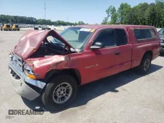 1998 Dodge Dakota SLT with VIN 1B7GL22X2WS665491, listed as a Copart auction lot 54877775 with 338,921 mi miles and Salvage title. Bid and sale history available at DreamBid. Image 1.