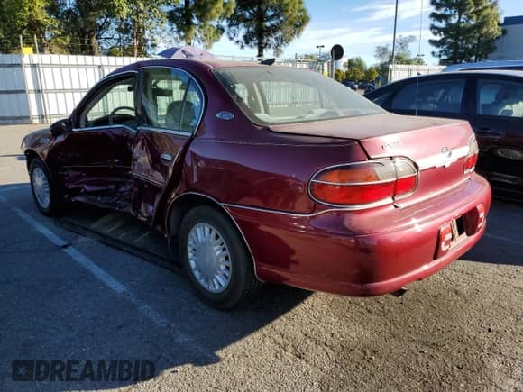 2004 Chevrolet Malibu Classic with VIN 1G1ND52F84M692489, listed as a Copart auction lot 40058164 with 67,717 mi miles and Salvage title. Bid and sale history available at DreamBid. Image 2.