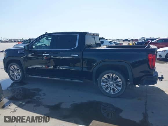 2020 GMC Sierra 1500 Denali with VIN 1GTU9FEL6LZ173499, listed as a IAAI auction lot 41856799 with 77,723 mi miles and . Bid and sale history available at DreamBid. Image 14.