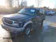 2000 Ford Explorer Eddie Bauer z VIN 1FMZU64E0YZB37690, wystawiony jako IAAI lot #41588446 z przebiegiem 184 471 mil mil oraz . Historia ofert i sprzedaży dostępna na DreamBid. Obrazek 2.