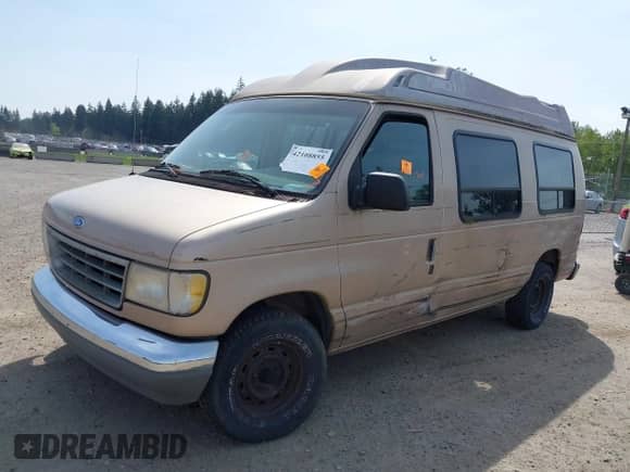 1996 Ford Econoline Cargo with VIN 1FDEE14H4THA09346, listed as a IAAI auction lot 42108855 with 150,061 mi miles and . Bid and sale history available at DreamBid. Image 2.