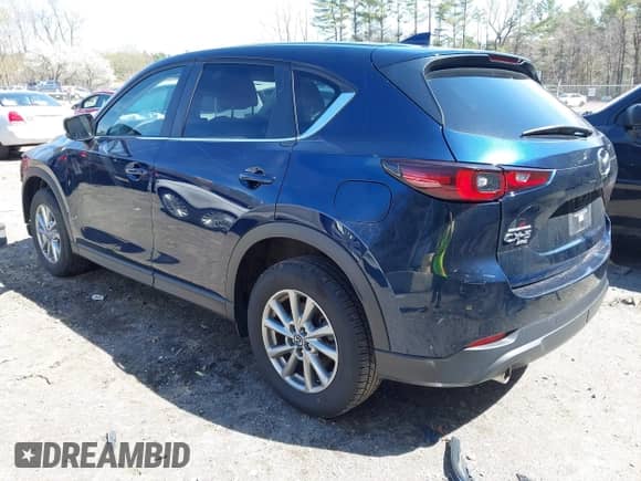 2022 Mazda CX-5 S Select z VIN JM3KFBBM8N0633363, wystawiony jako IAAI lot #42064278 z przebiegiem 69 226 mil mil oraz . Historia ofert i sprzedaży dostępna na DreamBid. Obrazek 3.