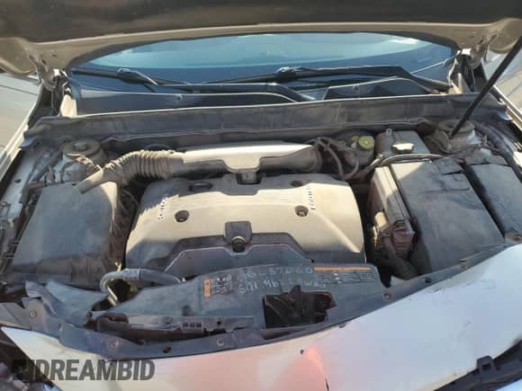 2015 Chevrolet Malibu LS z VIN 1G11B5SL7FF152066, wystawiony jako Copart lot #69140465 z przebiegiem 125 427 mil mil oraz Szkoda całkowita • Salvage title. Historia ofert i sprzedaży dostępna na DreamBid. Obrazek 11.