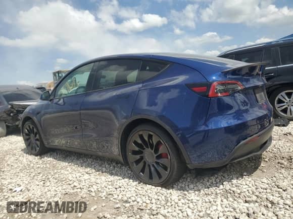 2022 Tesla Model Y Performance with VIN 7SAYGDEF6NF455028, listed as a Copart auction lot 61740254 with 26,869 mi miles and Salvage title. Bid and sale history available at DreamBid. Image 2.