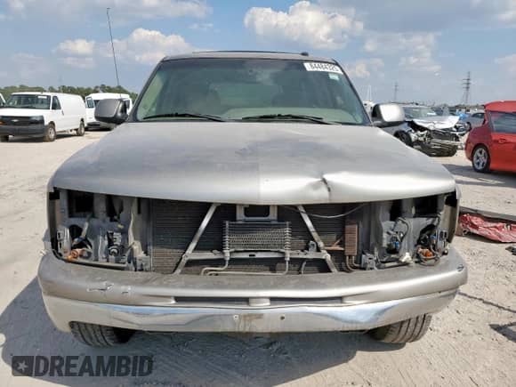 2003 Chevrolet Tahoe LS z VIN 1GNEC13Z13R103867, wystawiony jako Copart lot #84484325 z przebiegiem Nie podano mil oraz Szkoda całkowita • Salvage title. Historia ofert i sprzedaży dostępna na DreamBid. Obrazek 5.