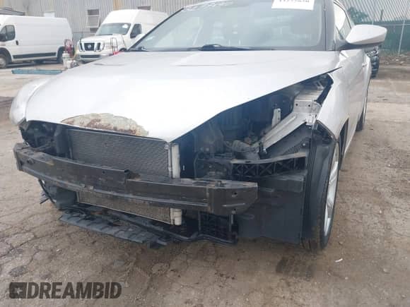 2013 Hyundai Veloster w/Black Int z VIN KMHTC6AD5DU136899, wystawiony jako IAAI lot #43277820 z przebiegiem 92 324 mil mil oraz . Historia ofert i sprzedaży dostępna na DreamBid. Obrazek 6.