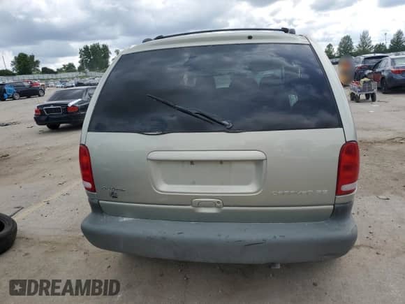 1999 Dodge Caravan SE with VIN 1B4GP45G7XB529075, listed as a Copart auction lot 60448215 with Not provided miles and Salvage title. Bid and sale history available at DreamBid. Image 6.