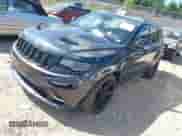 2014 Jeep Grand Cherokee SRT-8 с VIN 1C4RJFDJXEC198828, выставлен на аукционе IAAI как лот 43062946 с пробегом 106 856 миль миль и . История ставок и продаж доступна на DreamBid. Изображение 17.