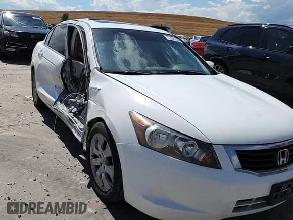 2008 Honda Accord EX-L с VIN JHMCP26818C032319, выставлен на аукционе Copart как лот 70415795 с пробегом 127 475 миль миль и Списание • Salvage title. История ставок и продаж доступна на DreamBid. Изображение 14.