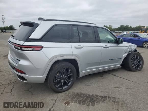 2023 Jeep Grand Cherokee with VIN 1C4RJYB64P8905194, listed as a Copart auction lot 69561485 with 10,071 mi miles and Salvage title. Bid and sale history available at DreamBid. Image 3.