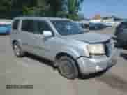 2009 Honda Pilot Touring with VIN 5FNYF48829B024561, listed as a Copart auction lot 66168365 with 150,536 mi miles and Salvage title. Bid and sale history available at DreamBid. Image 4.