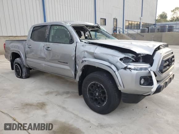 2021 Toyota Tacoma TRD Off Road с VIN 3TMCZ5AN3MM398298, выставлен на аукционе Copart как лот 80845945 с пробегом 35 049 миль миль и Списание • Salvage title. История ставок и продаж доступна на DreamBid. Изображение 4.