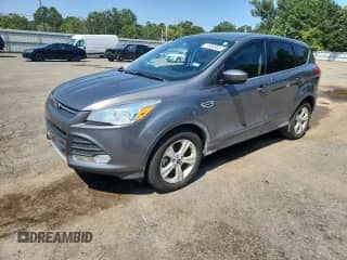 2014 Ford Escape SE with VIN 1FMCU0G98EUC75262, listed as a Copart auction lot 71550935 with 79,955 mi miles and Salvage title. Bid and sale history available at DreamBid. Image 1.