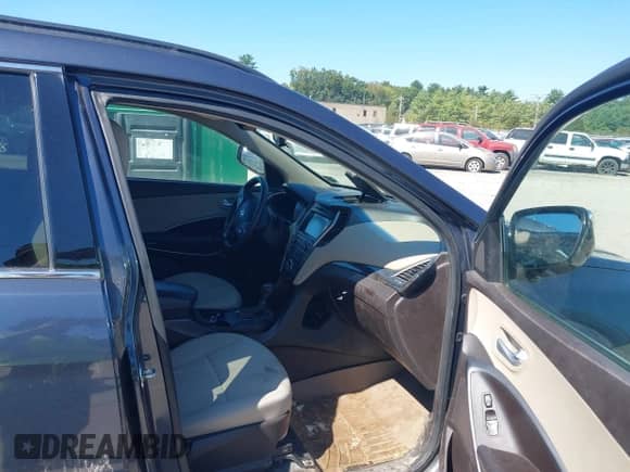 2018 Hyundai Santa Fe 2.4L z VIN 5NMZUDLB1JH062072, wystawiony jako IAAI lot #43131763 z przebiegiem 115 870 mil mil oraz . Historia ofert i sprzedaży dostępna na DreamBid. Obrazek 5.