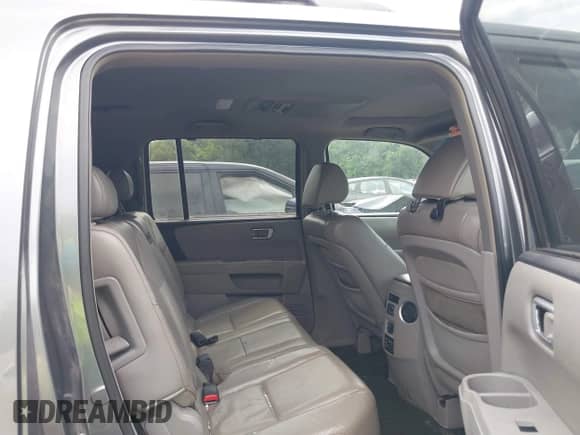 2009 Honda Pilot Touring with VIN 5FNYF48969B031280, listed as a IAAI auction lot 42934690 with 163,844 mi miles and . Bid and sale history available at DreamBid. Image 8.
