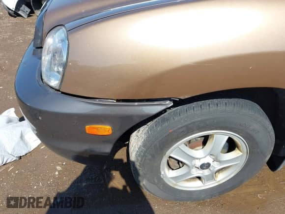 2002 Hyundai Santa Fe GLS z VIN KM8SC73DX2U270948, wystawiony jako IAAI lot #42157089 z przebiegiem 170 824 mil mil oraz . Historia ofert i sprzedaży dostępna na DreamBid. Obrazek 6.