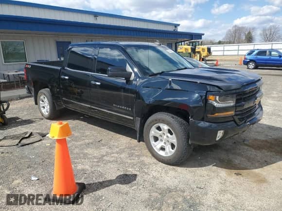 2018 Chevrolet Silverado 1500 LT z VIN 3GCUKREC4JG480415, wystawiony jako Copart lot #50585445 z przebiegiem 87 644 mil mil oraz Szkoda całkowita • Salvage title. Historia ofert i sprzedaży dostępna na DreamBid. Obrazek 4.