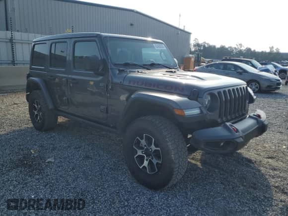 2021 Jeep Wrangler Unlimited Rubicon with VIN 1C4HJXFN7MW586520, listed as a Copart auction lot 65468535 with 101,181 mi miles and Salvage title. Bid and sale history available at DreamBid. Image 4.