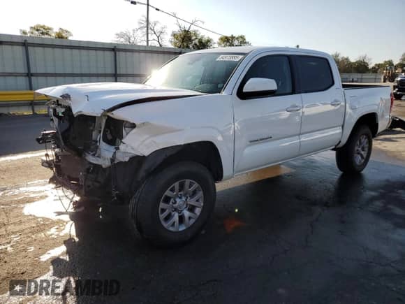 2020 Toyota Tacoma SR with VIN 5TFAX5GN3LX165499, listed as a Copart auction lot 84973885 with 67,043 mi miles and Salvage title. Bid and sale history available at DreamBid. Image 1.