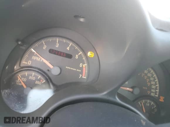 1999 Pontiac Grand Am GT z VIN 1G2NW12EXXM754842, wystawiony jako Copart lot #46940335 z przebiegiem 124 886 mil mil oraz Szkoda całkowita • Salvage title. Historia ofert i sprzedaży dostępna na DreamBid. Obrazek 9.