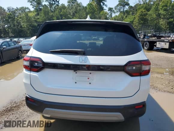 2023 Honda Pilot EX-L with VIN 5FNYG2H55PB008875, listed as a Copart auction lot 69849875 with 37,205 mi miles and Salvage title. Bid and sale history available at DreamBid. Image 6.