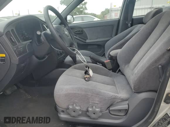 2005 Hyundai Elantra GLS z VIN KMHDN46D95U025270, wystawiony jako Copart lot #71040974 z przebiegiem 47 460 mil mil oraz Szkoda całkowita • Salvage title. Historia ofert i sprzedaży dostępna na DreamBid. Obrazek 7.