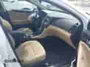 2013 Hyundai Sonata SE with VIN 5NPEC4ACXDH721965, listed as a IAAI auction lot 43201300 with 58,467 mi miles and . Bid and sale history available at DreamBid. Image 5.