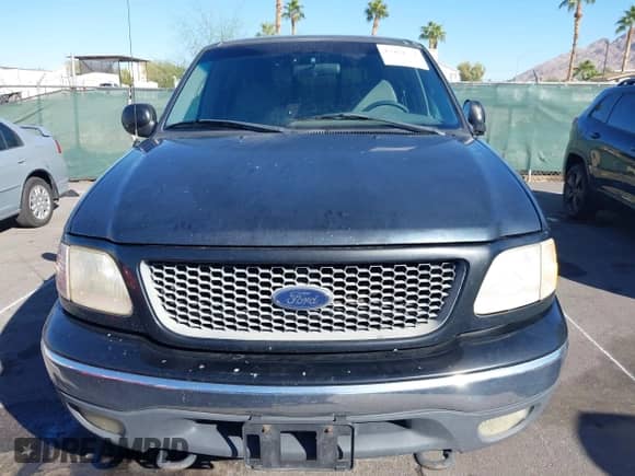 2000 Ford F-150 XL with VIN 1FTRX18W1YNC02247, listed as a IAAI auction lot 43464551 with Not provided miles and . Bid and sale history available at DreamBid. Image 6.