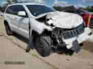 2019 Jeep Grand Cherokee Laredo E with VIN 1C4RJEAG9KC598264, listed as a Copart auction lot 87252015 with 101,546 mi miles and Salvage title. Bid and sale history available at DreamBid. Image 4.