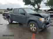 2015 Nissan Frontier SV with VIN 1N6AD0ERXFN761126, listed as a Copart auction lot 82246165 with 194,069 mi miles and Salvage title. Bid and sale history available at DreamBid. Image 4.