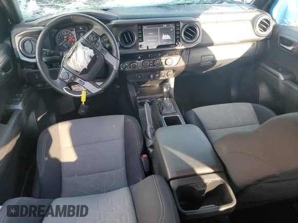 2023 Toyota Tacoma SR5 with VIN 3TMDZ5BN6PM166091, listed as a Copart auction lot 81668855 with 25,063 mi miles and Salvage title. Bid and sale history available at DreamBid. Image 8.