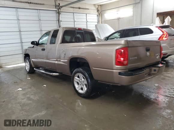 2010 Dodge Dakota z VIN 1D7CE3BK6AS141021, wystawiony jako Copart lot #79409574 z przebiegiem 126 836 mil mil oraz Szkoda całkowita • Salvage title. Historia ofert i sprzedaży dostępna na DreamBid. Obrazek 2.