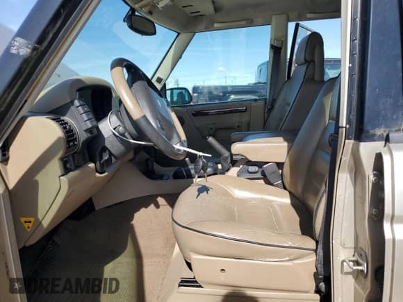 1999 Land Rover Discovery с VIN SALTY1248XA201489, выставлен на аукционе Copart как лот 50595005 с пробегом Не указан миль и Чистый • Clean title. История ставок и продаж доступна на DreamBid. Изображение 7.