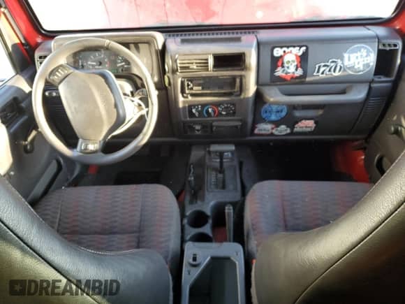 2000 Jeep Wrangler Sport z VIN 1J4FA49SXYP768858, wystawiony jako Copart lot #72104145 z przebiegiem 228 361 mil mil oraz Szkoda całkowita • Salvage title. Historia ofert i sprzedaży dostępna na DreamBid. Obrazek 8.