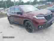 2021 Honda Passport Elite z VIN 5FNYF8H09MB001692, wystawiony jako IAAI lot #42602671 z przebiegiem 45 098 mil mil oraz . Historia ofert i sprzedaży dostępna na DreamBid. Obrazek 1.