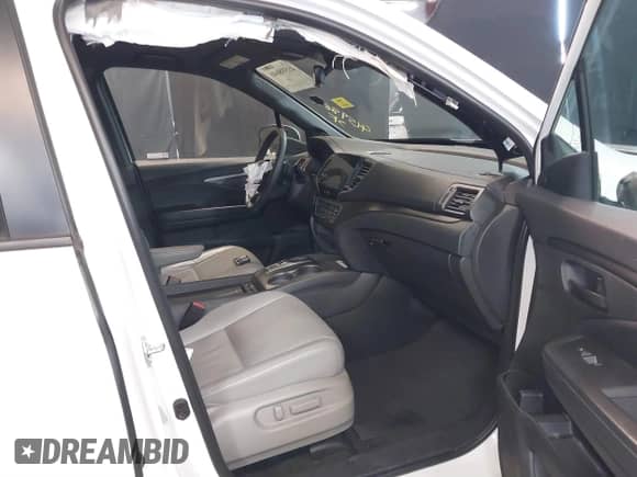 2022 Honda Passport EX-L with VIN 5FNYF8H52NB001840, listed as a IAAI auction lot 41598646 with 53,734 mi miles and . Bid and sale history available at DreamBid. Image 5.