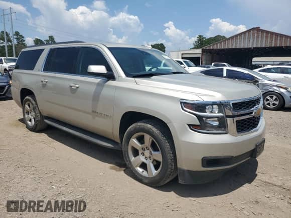 2017 Chevrolet Suburban LT с VIN 1GNSCHKCXHR296021, выставлен на аукционе Copart как лот 61767585 с пробегом 211 282 миль миль и Списание • Salvage title. История ставок и продаж доступна на DreamBid. Изображение 4.