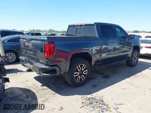 2022 GMC Sierra 1500 AT4 with VIN 1GTP9EEL4NZ118639, listed as a IAAI auction lot 41972691 with 53,690 mi miles and . Bid and sale history available at DreamBid. Image 4.