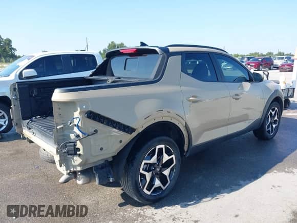 2023 Hyundai Santa Cruz Limited z VIN 5NTJEDAF6PH071136, wystawiony jako IAAI lot #42913930 z przebiegiem 33 057 mil mil oraz . Historia ofert i sprzedaży dostępna na DreamBid. Obrazek 4.